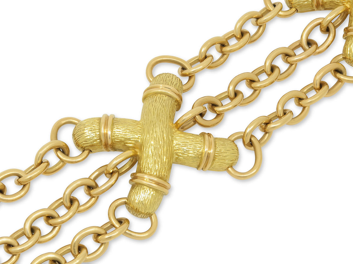 Textured gold triple strand bracelet with X links