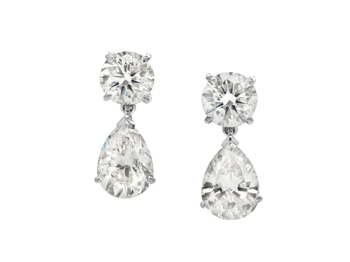 Platinum diamond drop earrings with pear shaped stones