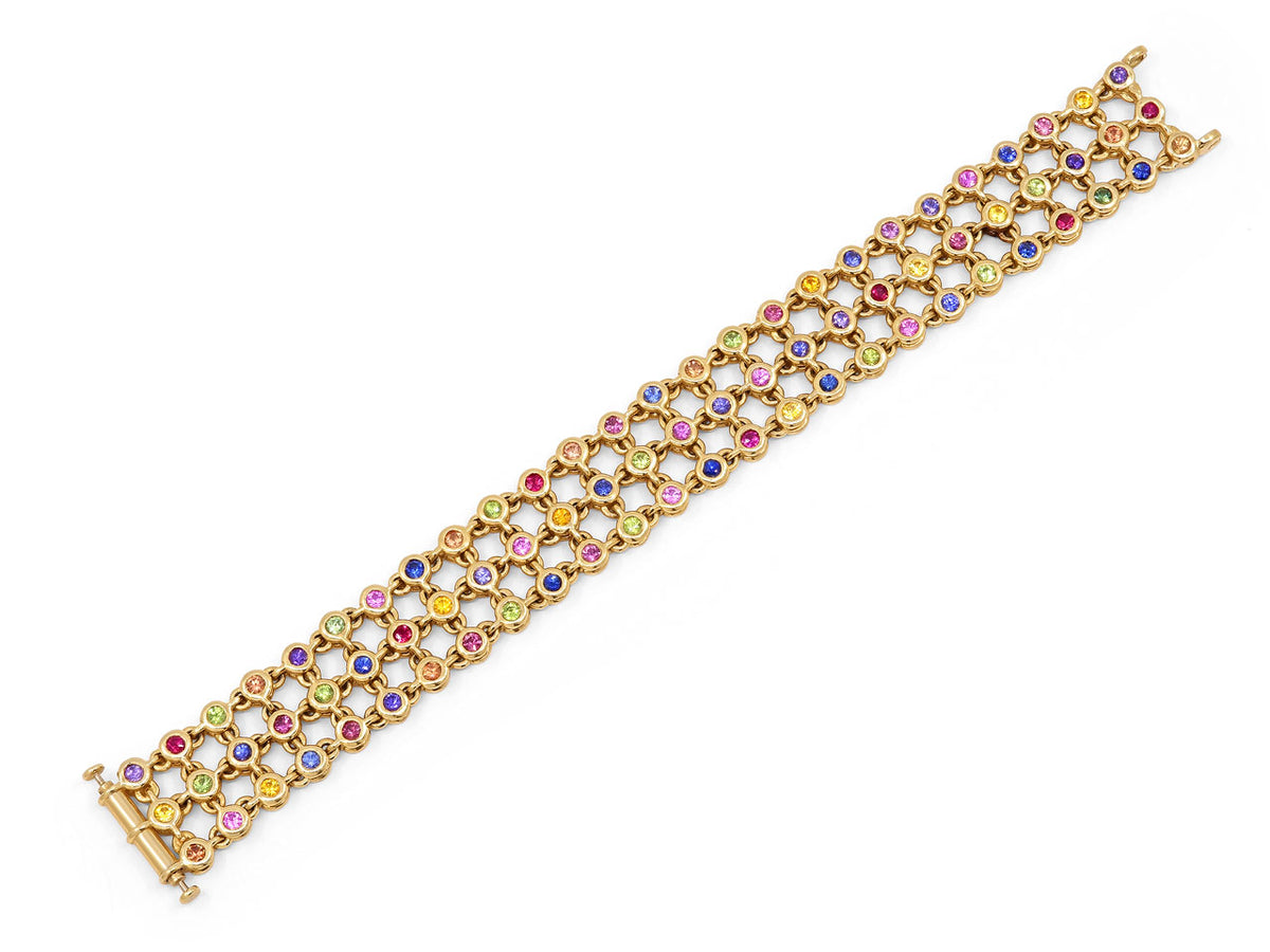 18K gold reversible bracelet with diamonds sapphires and rubies