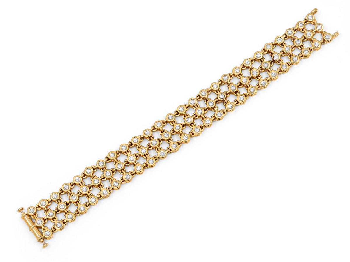 18K gold bracelet with three rows of diamond links
