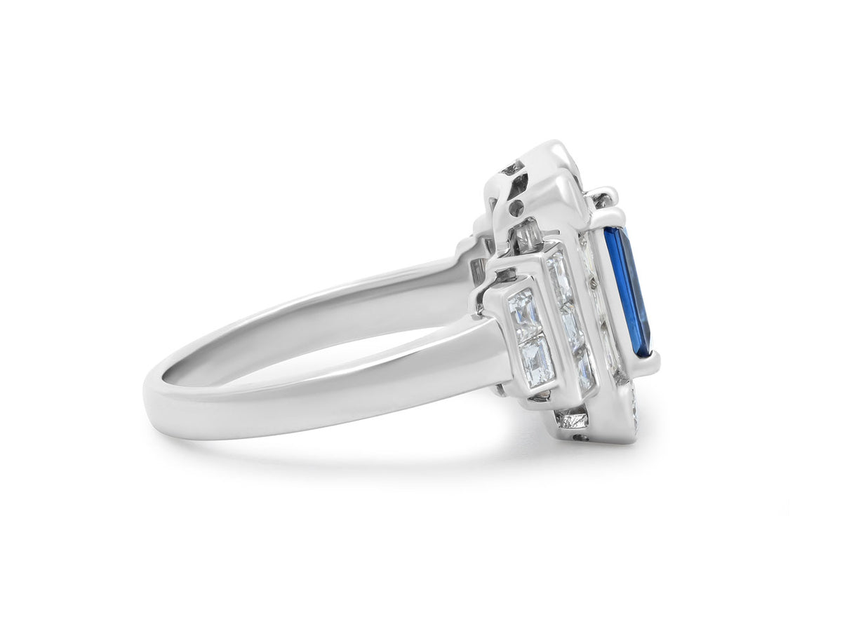 Side view of platinum ring with blue sapphire and diamonds