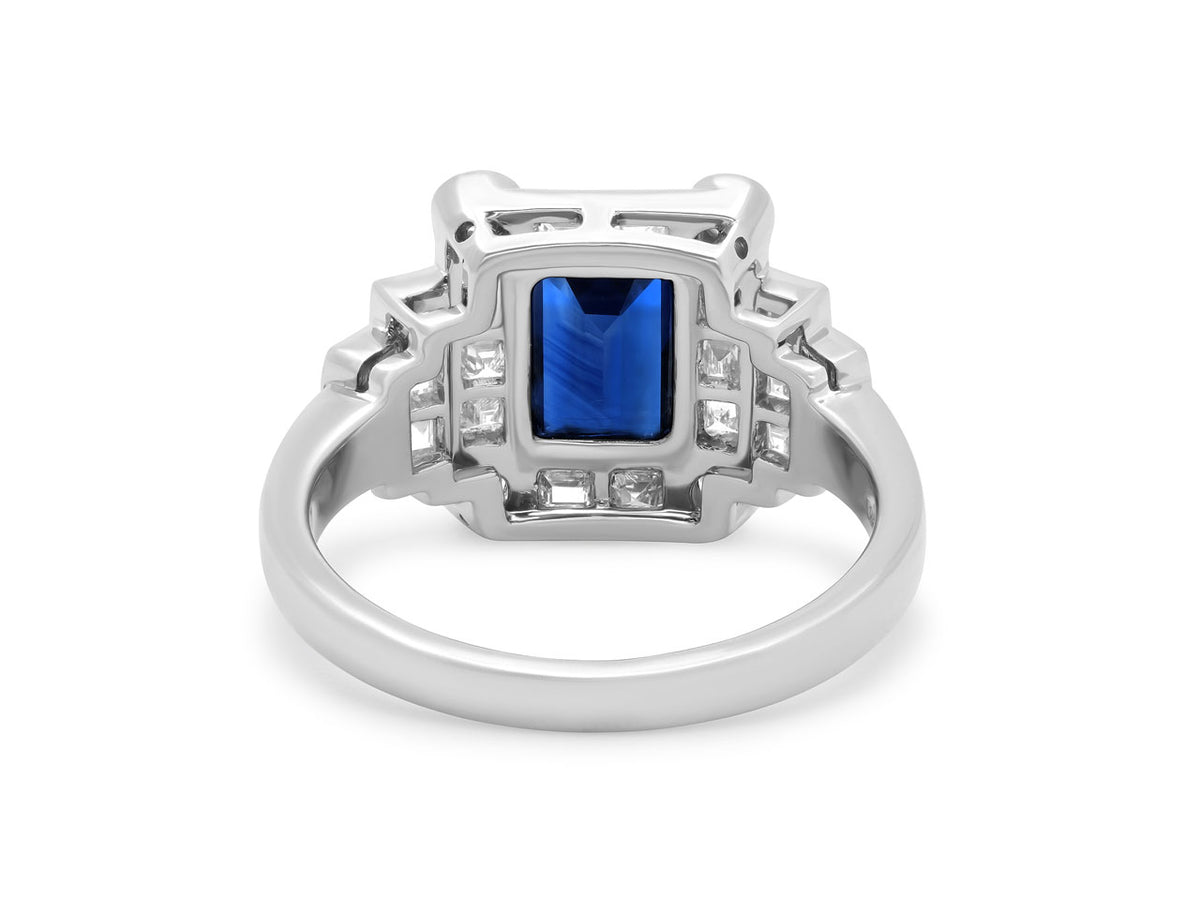 Back view of platinum ring with blue sapphire and diamonds