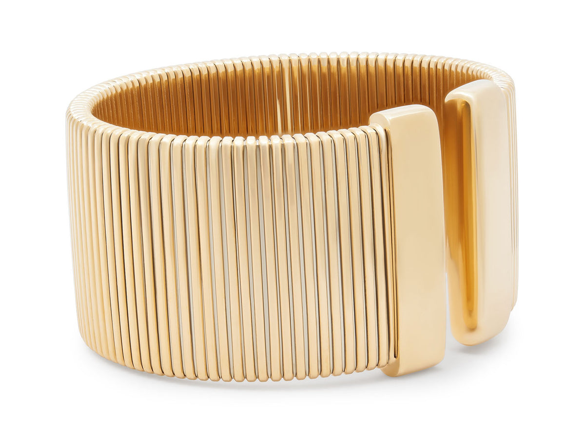 Wide polished 18K yellow gold tubogas cuff bracelet