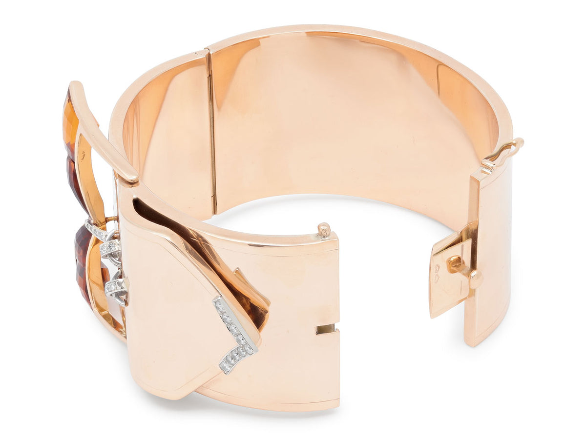 Open rose gold cuff bracelet with diamond buckle details