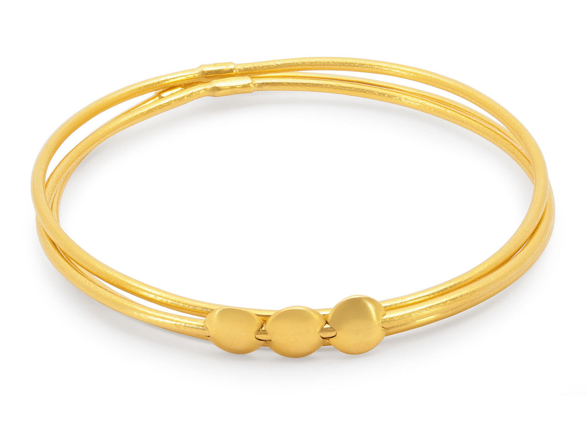 Textured 24K gold bangle with three sliding discs
