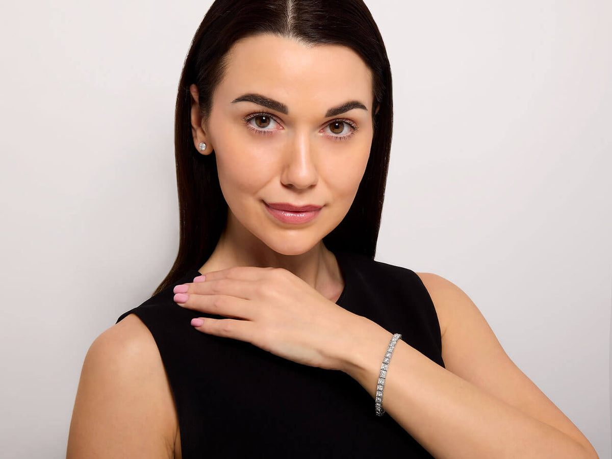 Woman wearing a platinum diamond line bracelet