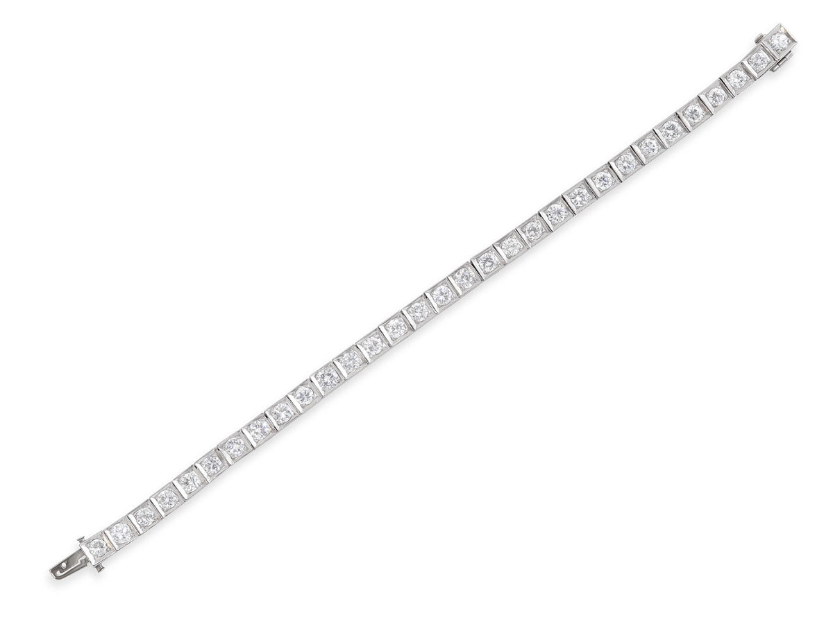 Platinum bracelet with square diamond set links