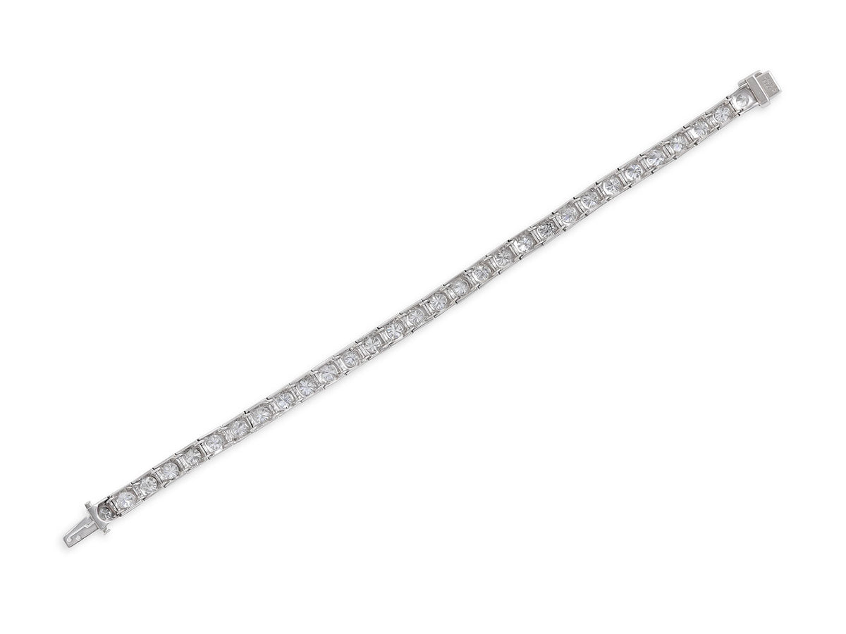 Platinum bracelet with square diamond set links