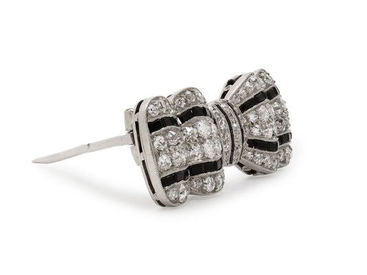 Antique Edwardian Diamond and Onyx Bow Brooch in Platinum