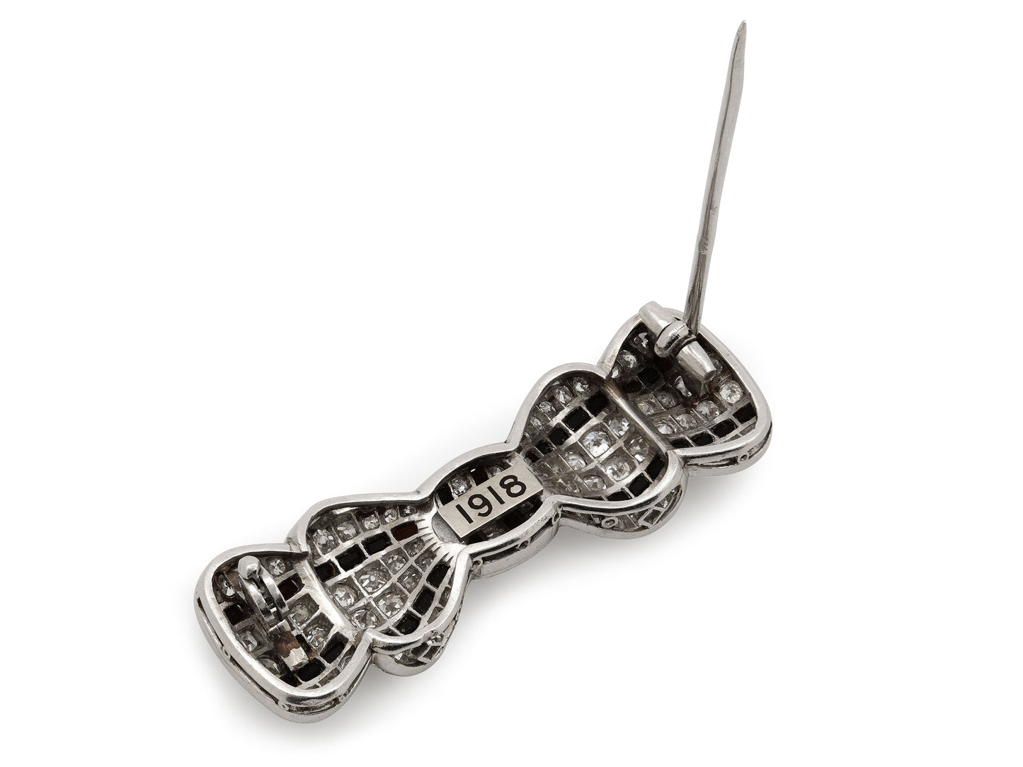 Antique Edwardian Diamond and Onyx Bow Brooch in Platinum