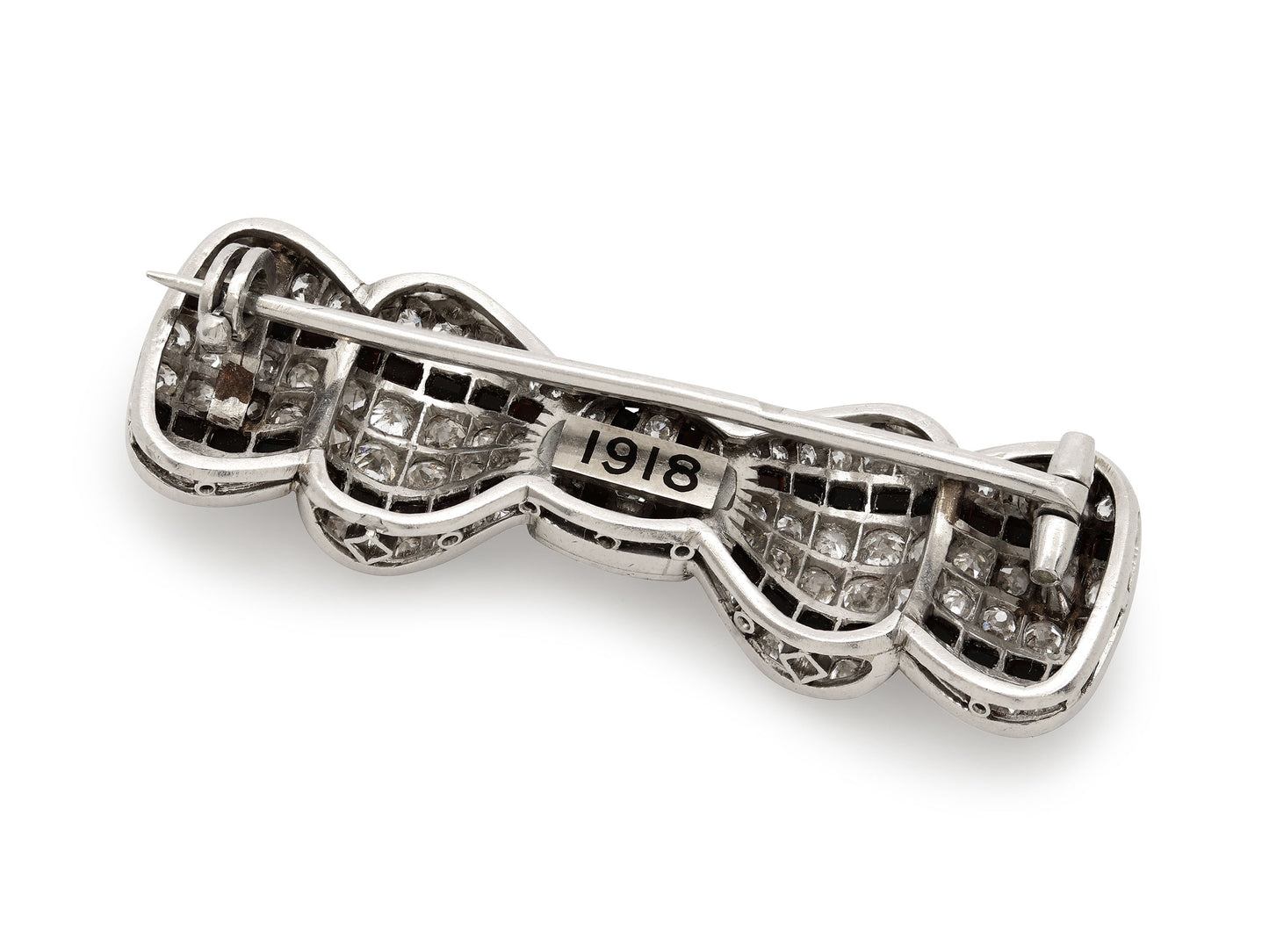 Antique Edwardian Diamond and Onyx Bow Brooch in Platinum