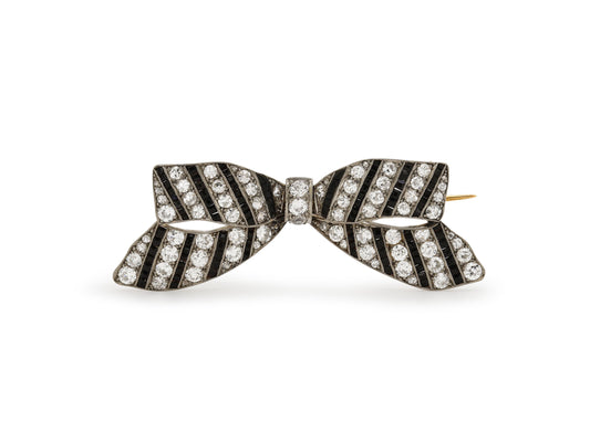 Antique Edwardian Diamond and Onyx Bow Brooch in Platinum over 18K Gold