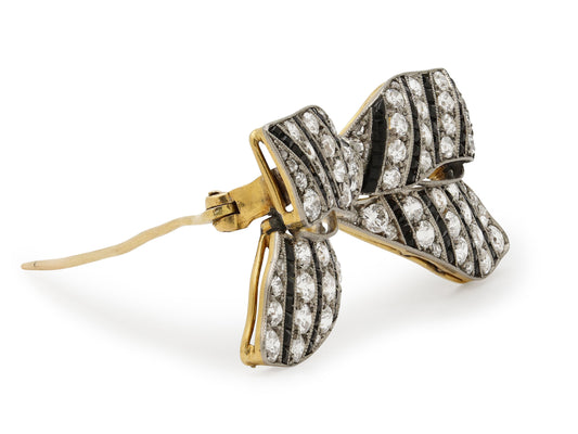 Antique Edwardian Diamond and Onyx Bow Brooch in Platinum over 18K Gold