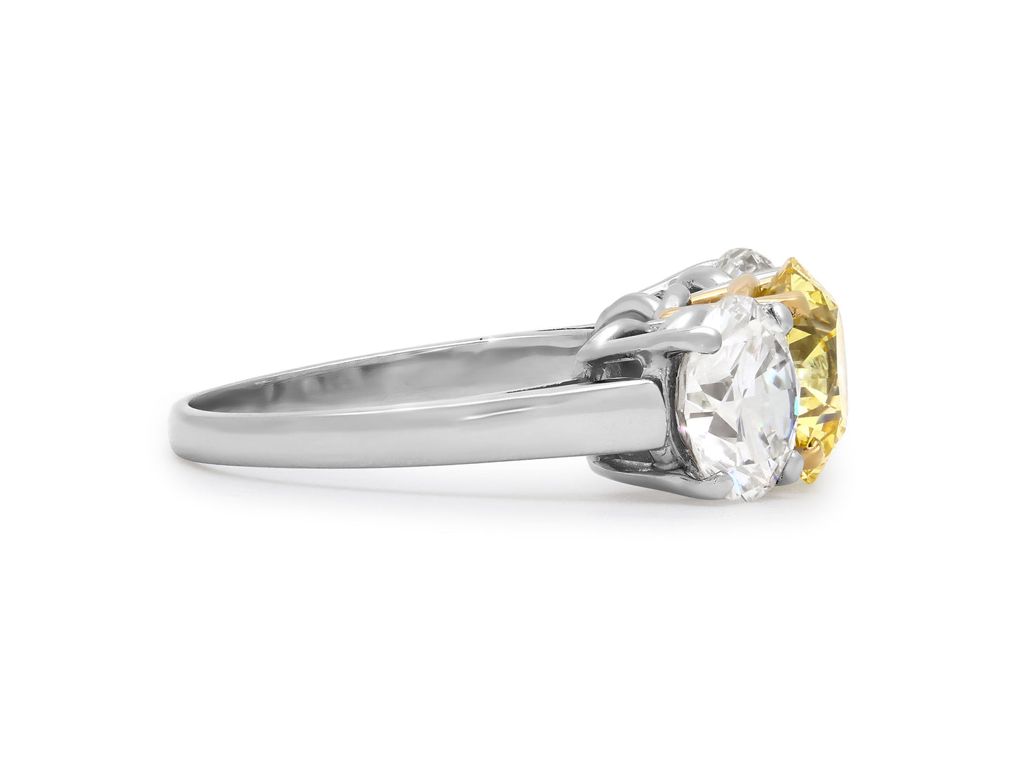 Three Stone Fancy Yellow Diamond Ring, 2.06 carats, in Platinum