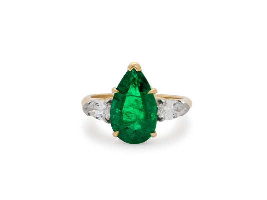 Harry Winston Emerald and Diamond Ring in 18K Gold and Platinum with pear cut emerald and diamond accents, by Beladora