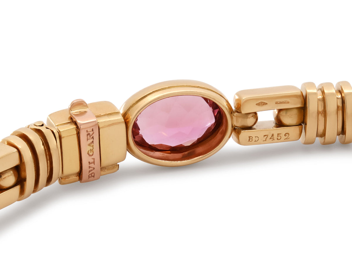 Bulgari Kunzite and Blue Topaz Bracelet in 18K Gold with pink kunzite centerpiece, fluted gold links, and signed clasp