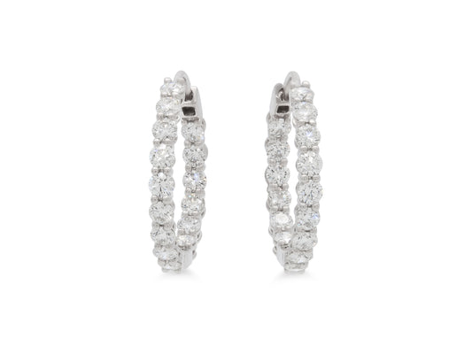 Tiffany & Co. Diamond Hoop Earrings in Platinum, hinged diamond hoops with 15 prong set round brilliant diamonds, by Beladora